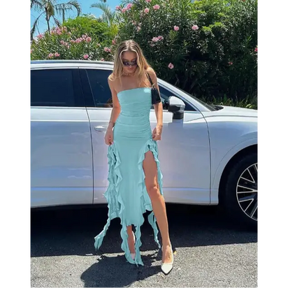 Light blue strapless dress with ruffled slits.