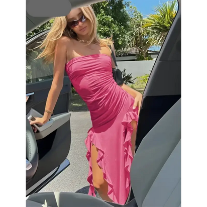 Pink strapless ruffled dress.