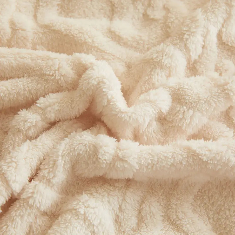 Soft, textured, cream-colored fabric.
