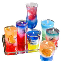 Colorful gel candles in glass containers.