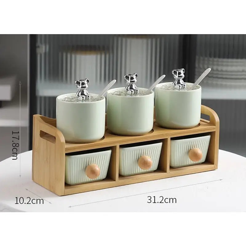 Ceramic spice rack with bear-shaped lids.