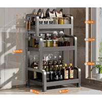 Three-tiered metal spice rack on kitchen shelf spice stand for organized cooking storage