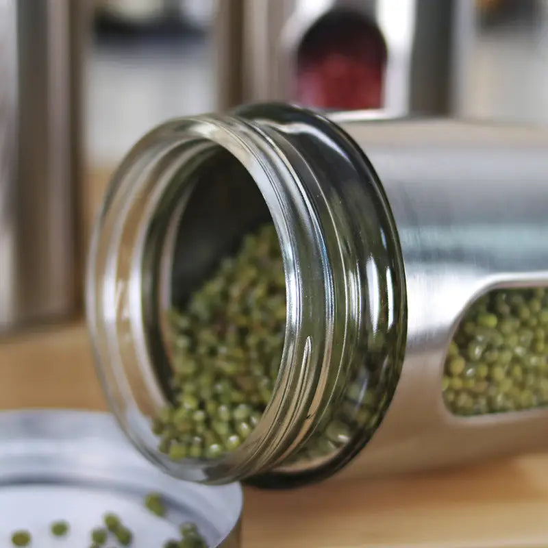 Glass jar with green mung beans in Kitchenware Stainless Steel Visible Glass Canister Set