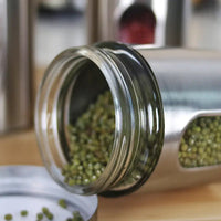 Glass jar with green mung beans in Kitchenware Stainless Steel Visible Glass Canister Set