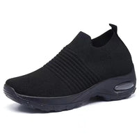 Black slip-on athletic shoe.