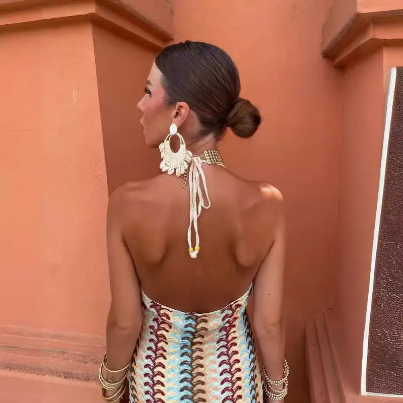 Backless halter dress.