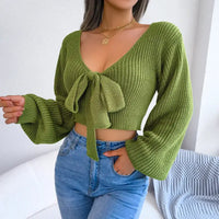 Green knit tie-front crop top.