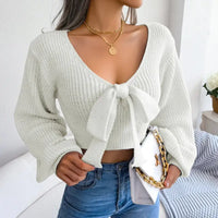White knit tie-front sweater.