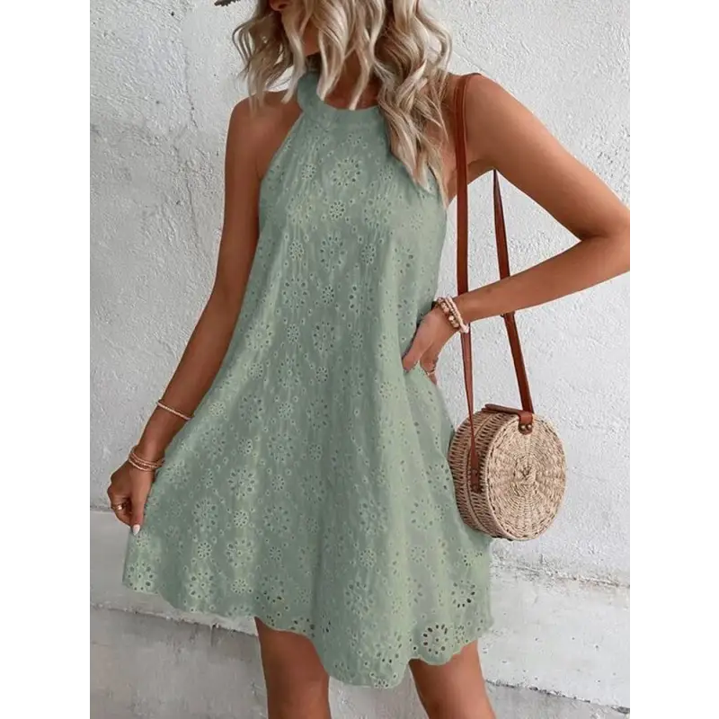 Light green eyelet halter dress.