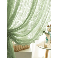 Green floral lace curtain.