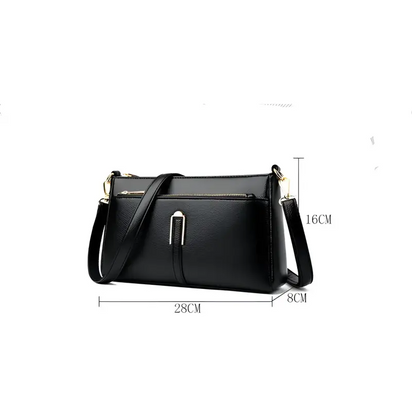 Black leather shoulder bag with dimensions.