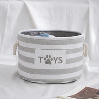 Striped toy storage bin.