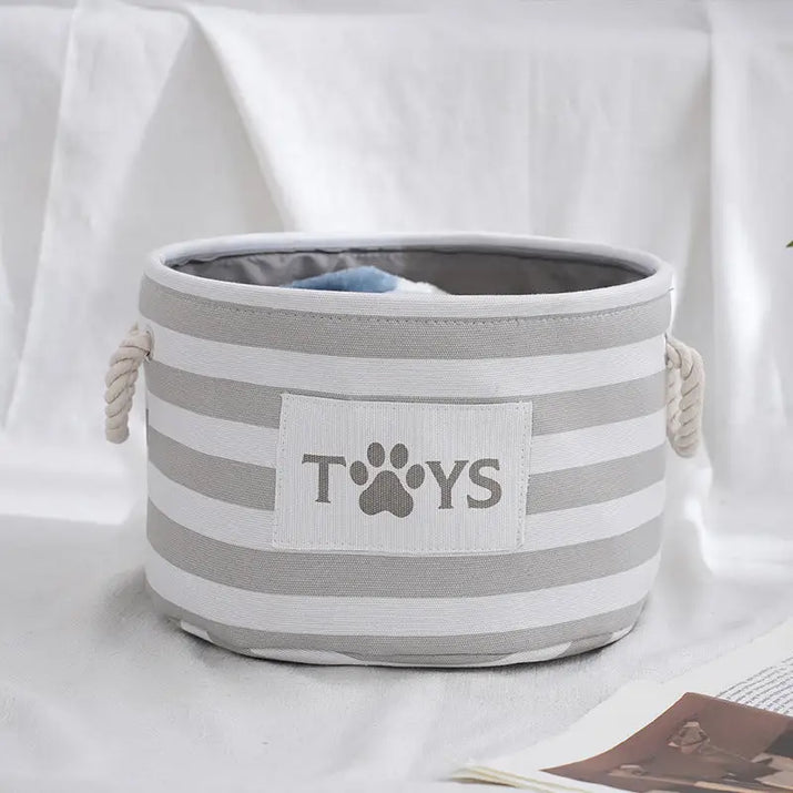 Striped toy storage bin.