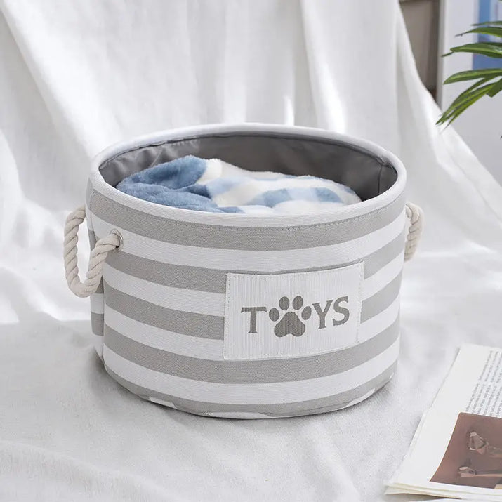 Striped toy storage bin.