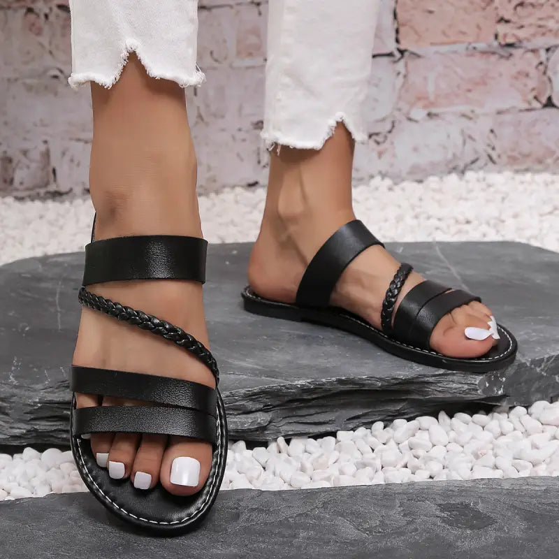 Black leather multi-strap sandals.