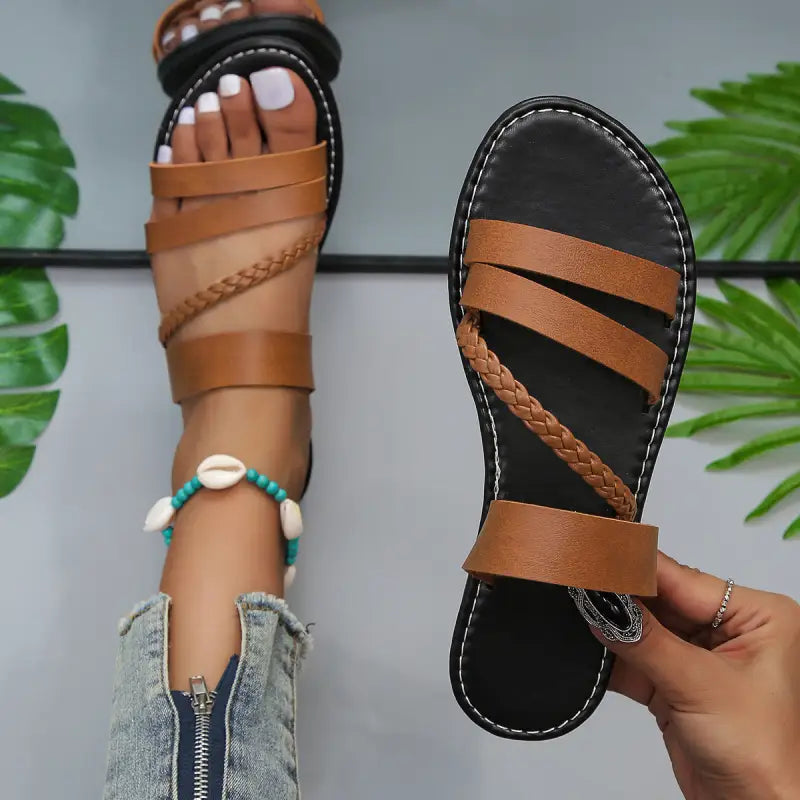 Brown strappy sandals.