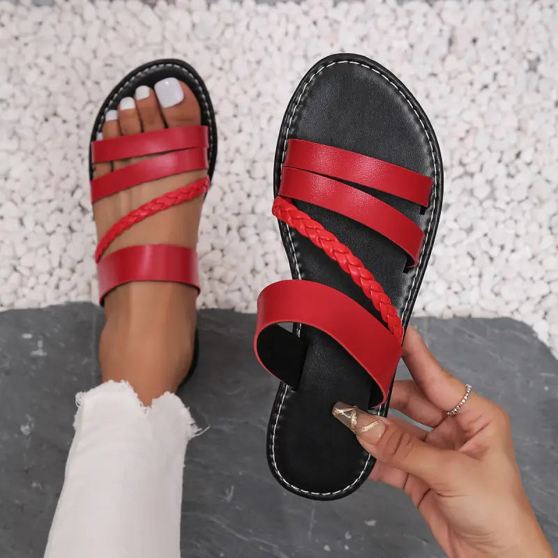 Red leather braided sandals.