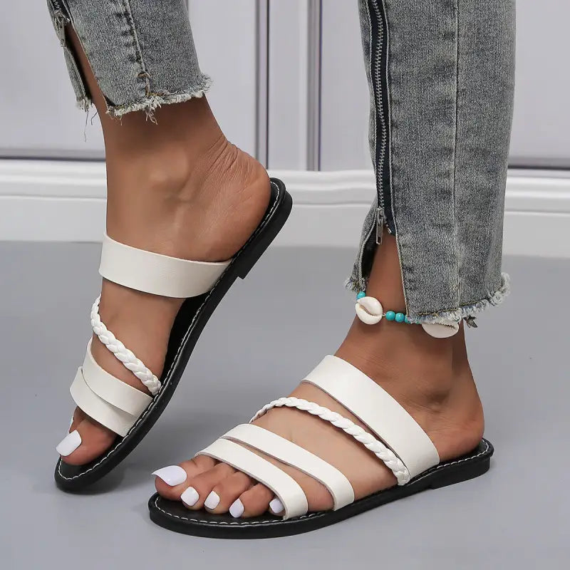 White multi-strap sandals.