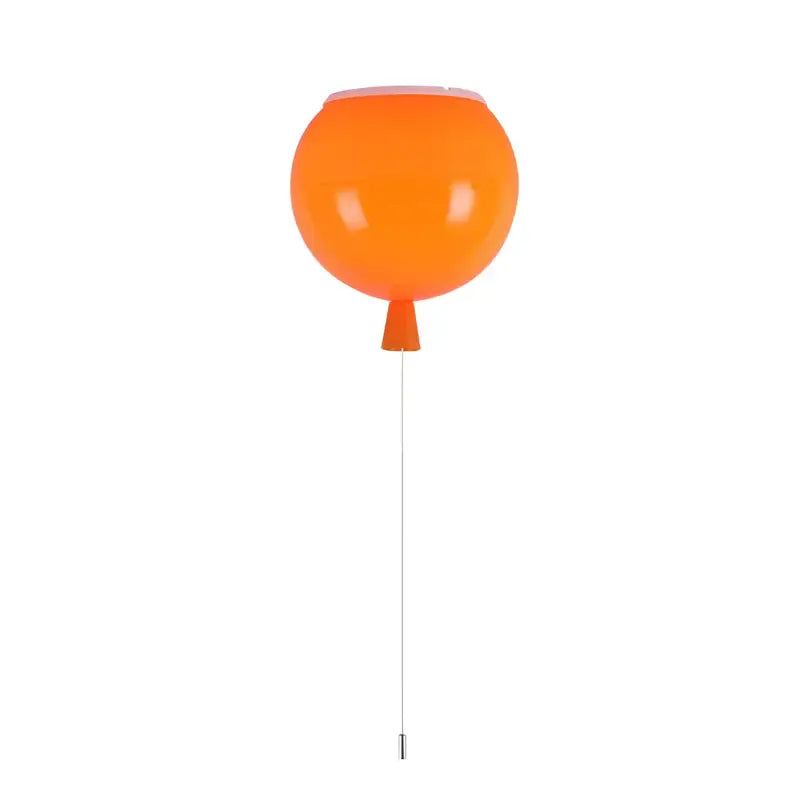 Orange balloon-shaped wall light.