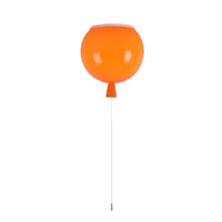 Orange balloon-shaped wall light.