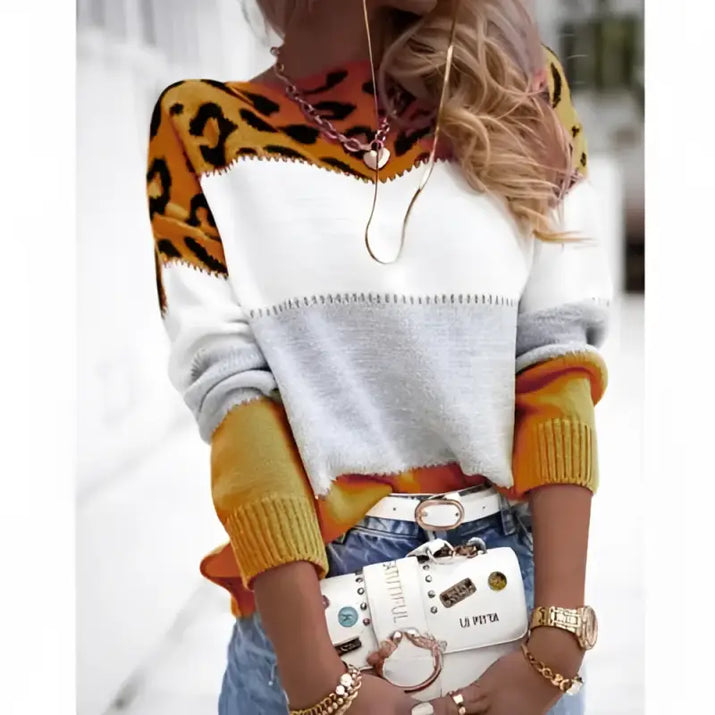 Color-blocked sweater with leopard print.