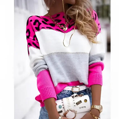 Color-blocked sweater with pink leopard print.