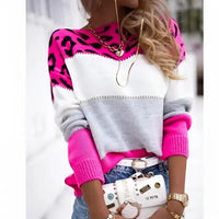 Color-blocked sweater with pink leopard print.