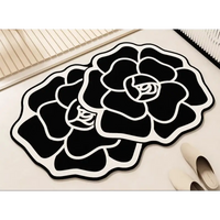 Black and white floral rug.
