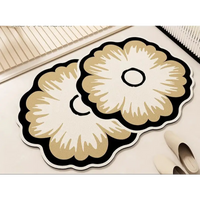 Floral-shaped bath mats.