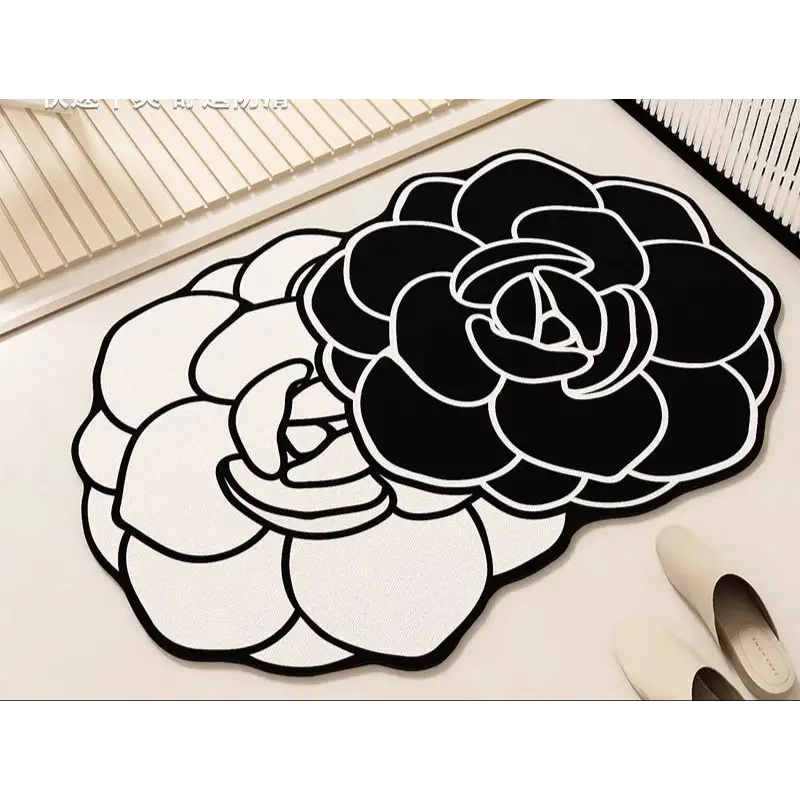 Black and white floral-shaped rugs.
