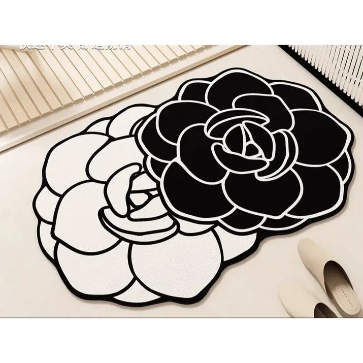 Black and white floral-shaped rugs.
