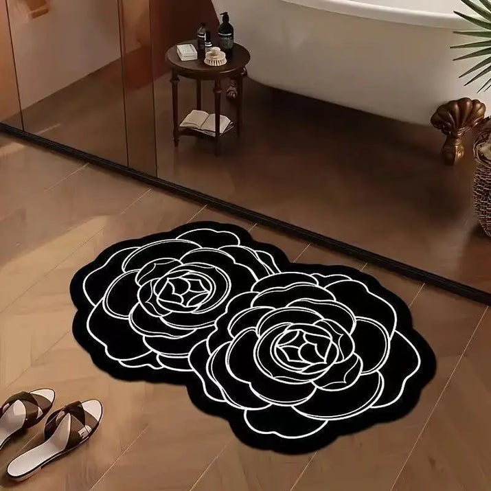 Black and white floral bath mat.