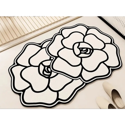 Floral-shaped, black and white rugs.