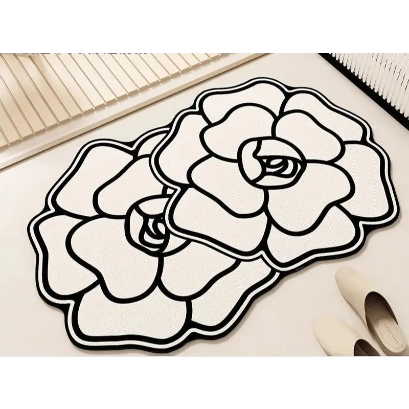 Floral-shaped, black and white rugs.