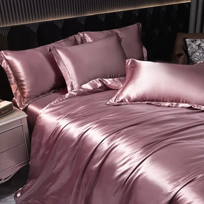 Shiny pink satin bedding.