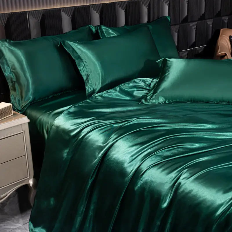 Lustrous emerald green satin bedding.