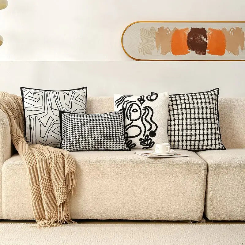 Couch with decorative pillows.