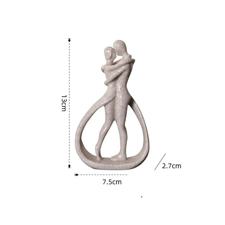 Abstract embracing couple sculpture.