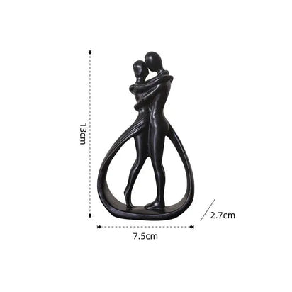 Abstract couple sculpture with dimensions.