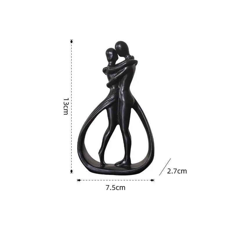 Abstract couple sculpture with dimensions.