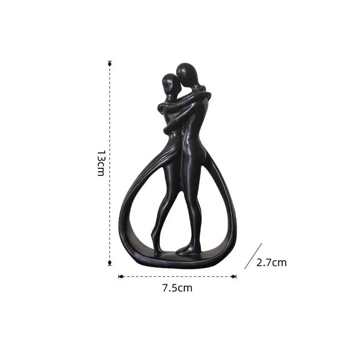 Abstract couple sculpture with dimensions.