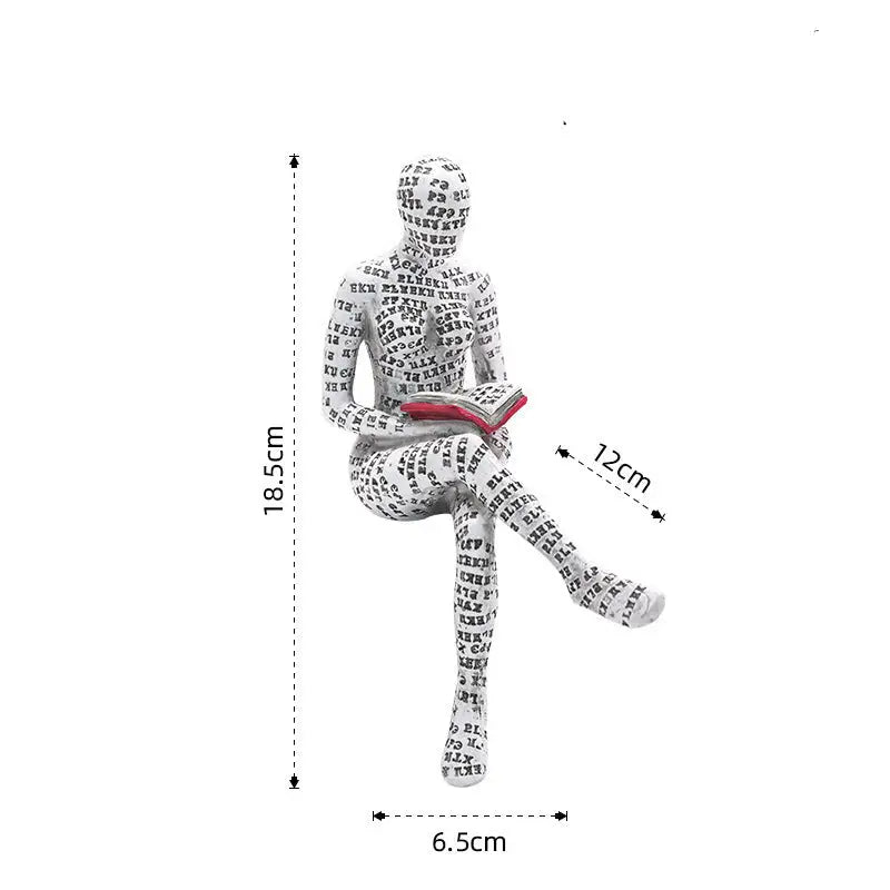 Seated figure covered in text reading a book.