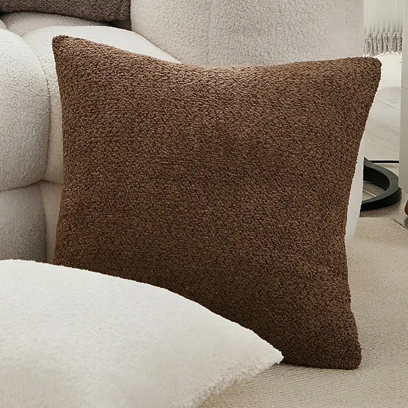 Brown textured throw pillow.