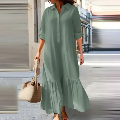 Sage green, long-sleeved, collared maxi dress.