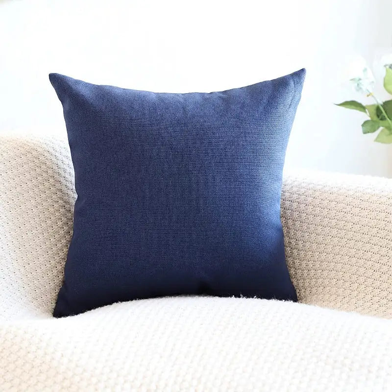 Blue square throw pillow.