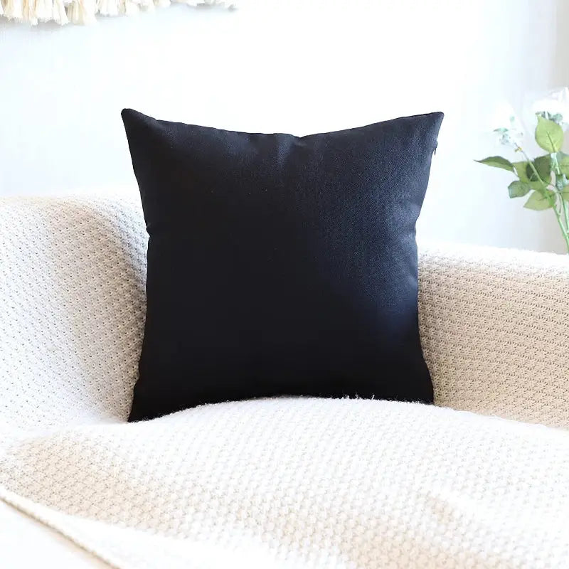 Black square pillow.
