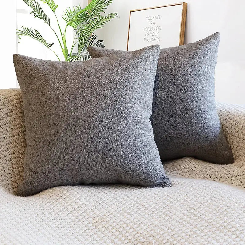 Two gray throw pillows.
