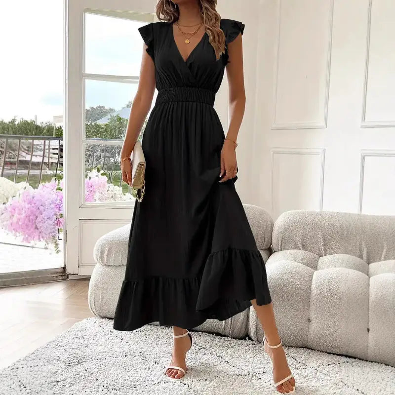 Black V-neck midi dress.
