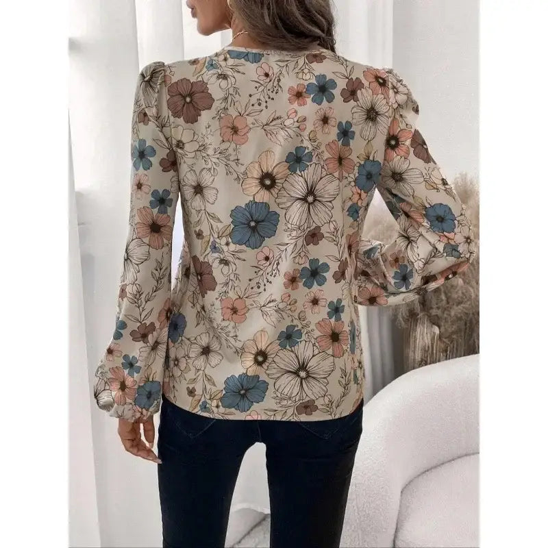 Floral print long-sleeved blouse.