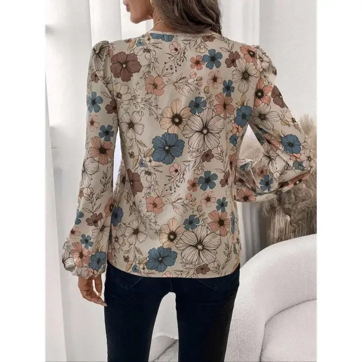 Floral print long-sleeved blouse.